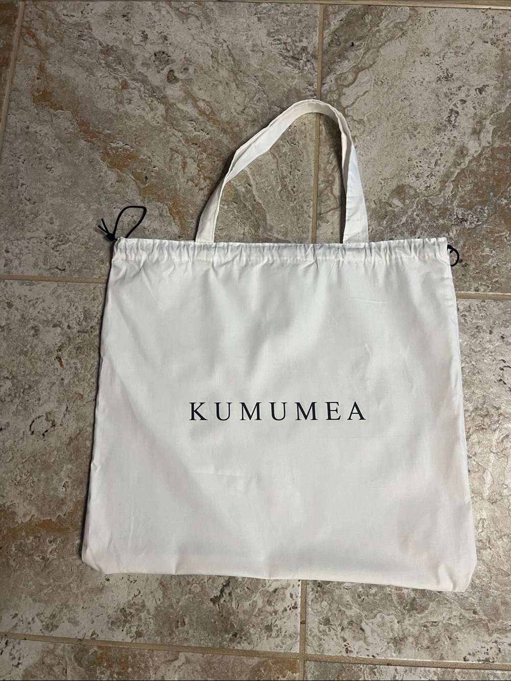 Two sided KUMUMEA draw string bag in great condition